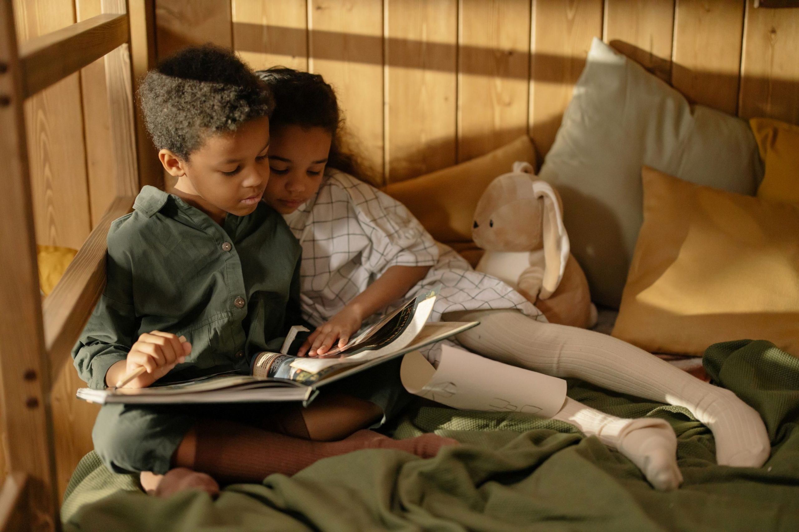Siblings reading together
