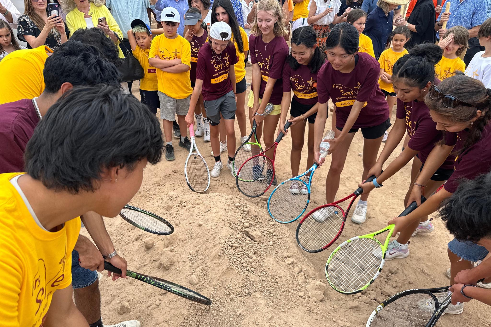 tennis students attending school groundbreaking