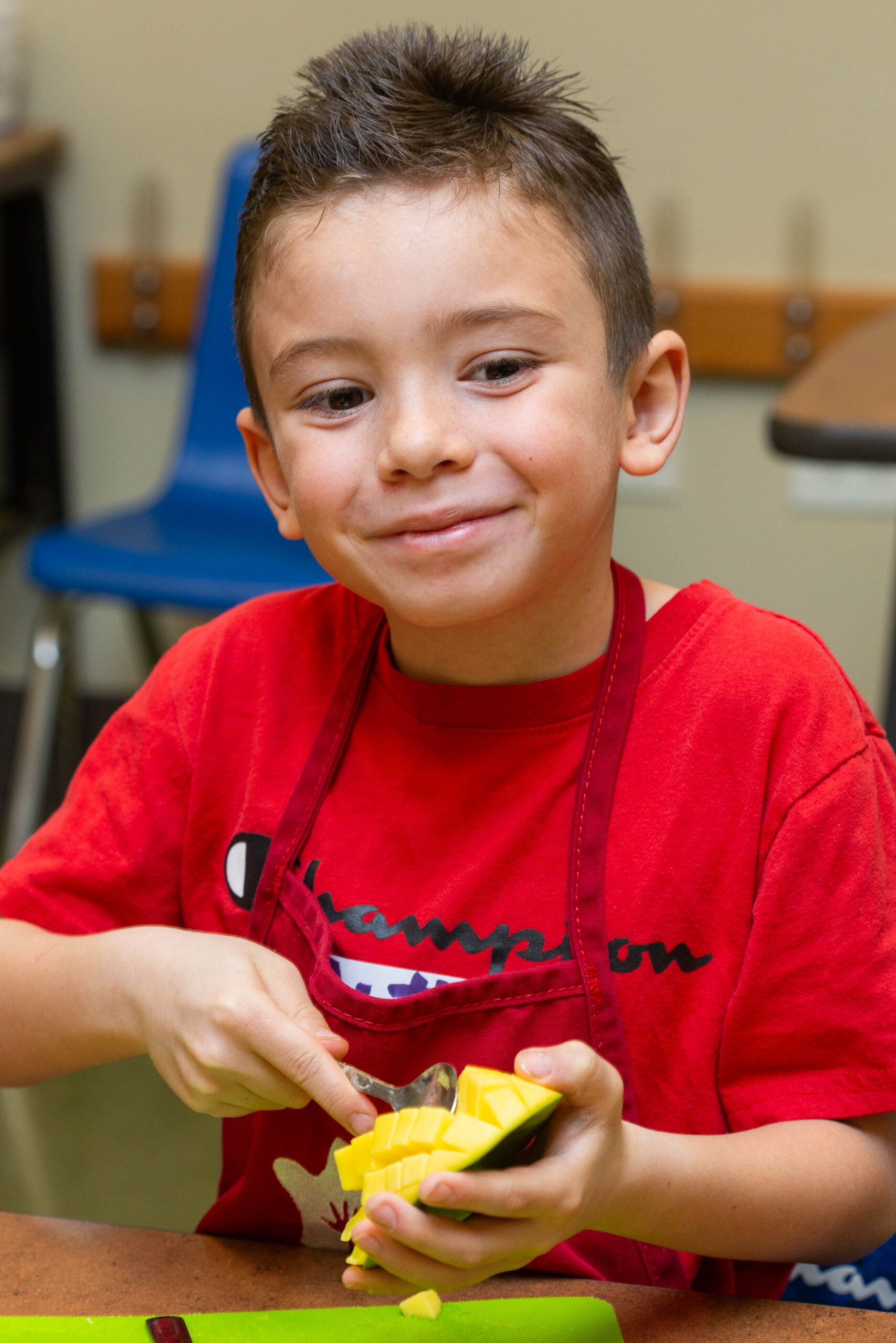Scooping Mango in CWK Cooking