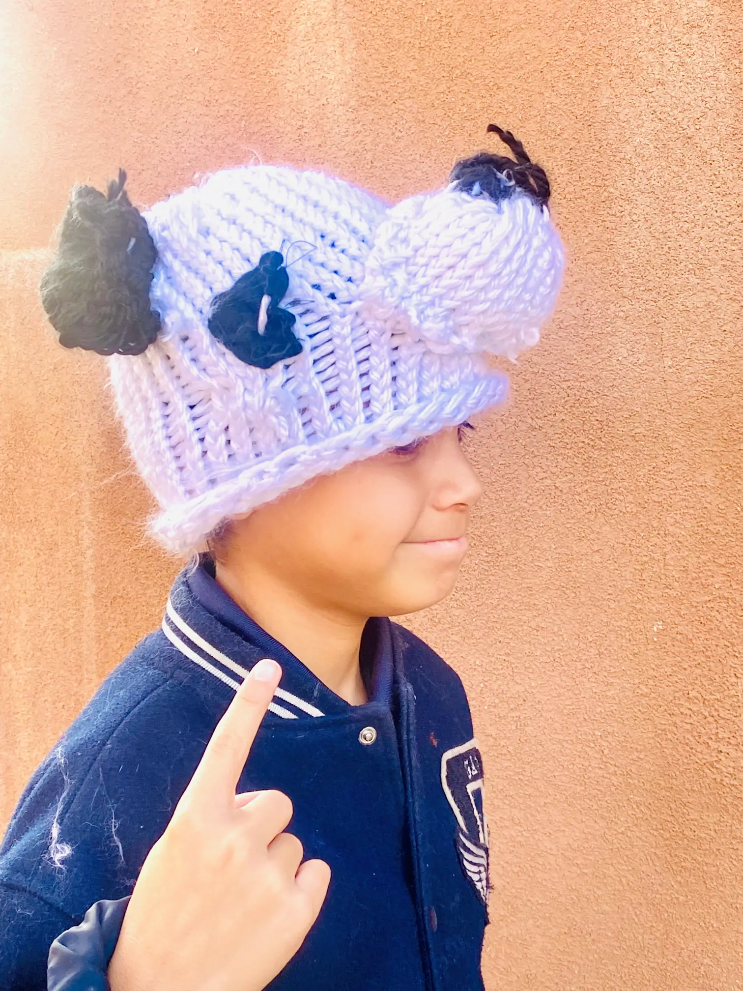 student shows off fun beanie!