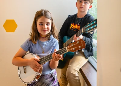 Calvin and Alma with their instruments