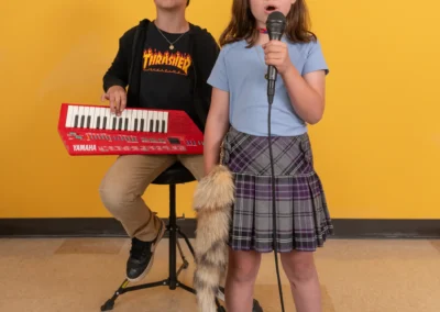 Calvin Lovato and Alma Lovato performing
