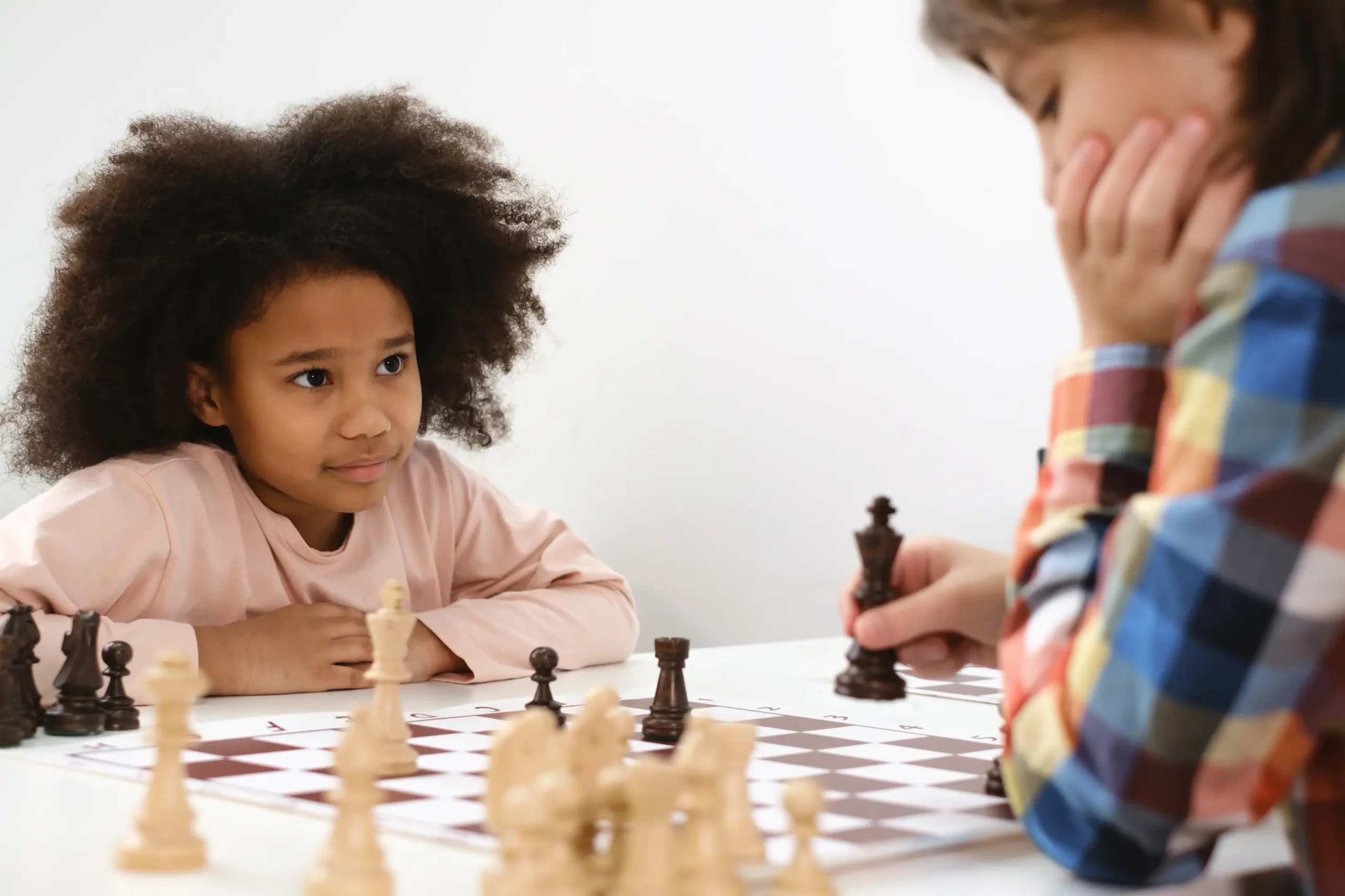 Two Kids Playing Chess